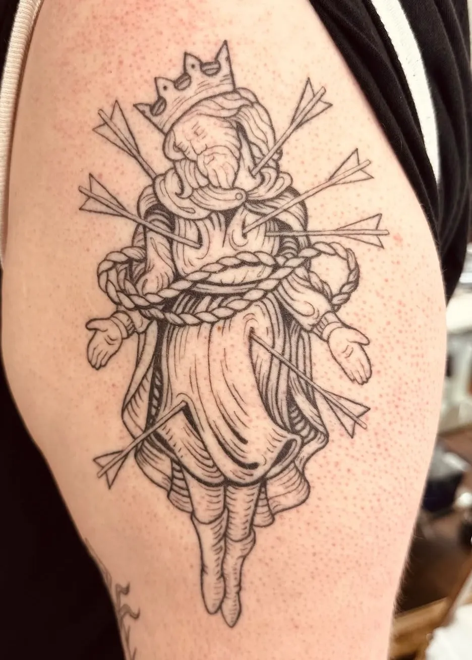 Crowned martyr king pierced with arrows, medieval linework thigh tattoo by Hannah at Shade Studio Peterborough