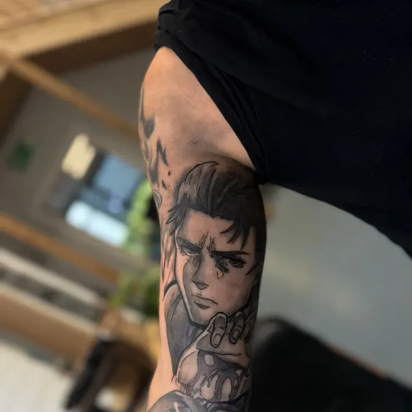 Anime character portraits in black and grey, full arm sleeve by Kai at Shade Studio Peterborough