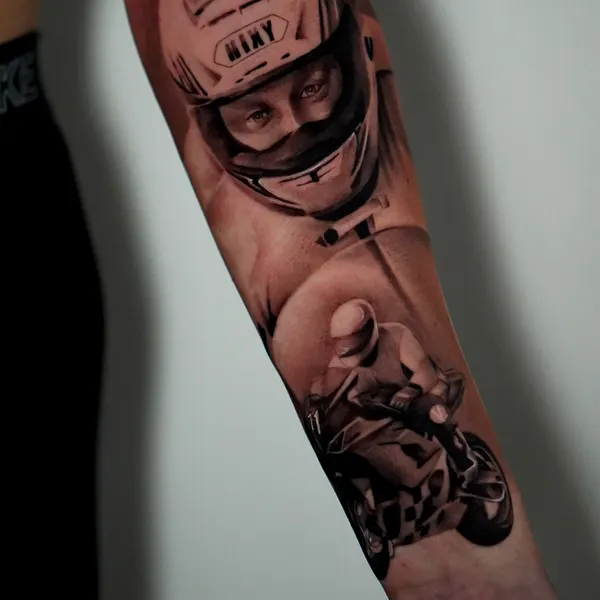 black and grey motorcycle racer in full helmet, detailed forearm piece