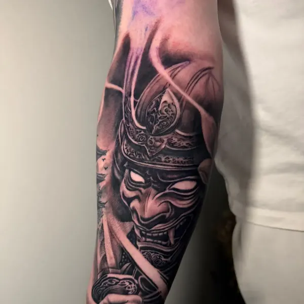Samurai warrior with hannya mask, black and grey forearm sleeve by Raf at Shade Studio Peterborough