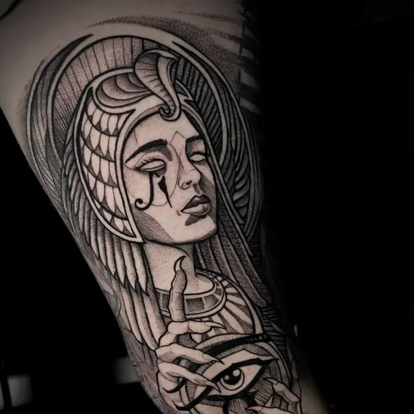 Egyptian goddess with Eye of Horus in blackwork and dotwork, arm tattoo by Raf at Shade Studio Peterborough
