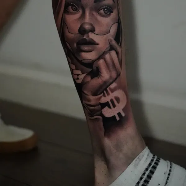 chicano payasa face with bold dollar sign lettering running down the shin