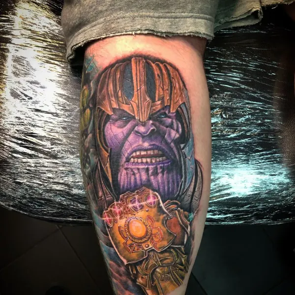 Colour realism Thanos with the Infinity Gauntlet, calf tattoo by Raf at Shade Studio Peterborough