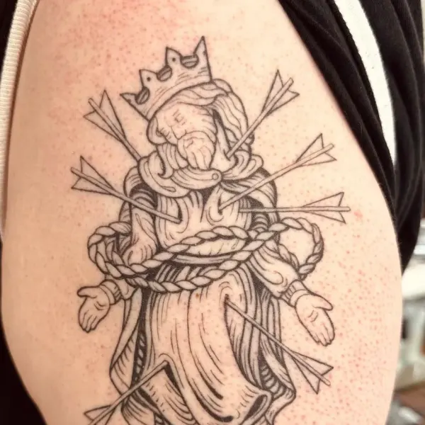 Crowned martyr king pierced with arrows, medieval linework thigh tattoo by Hannah at Shade Studio Peterborough