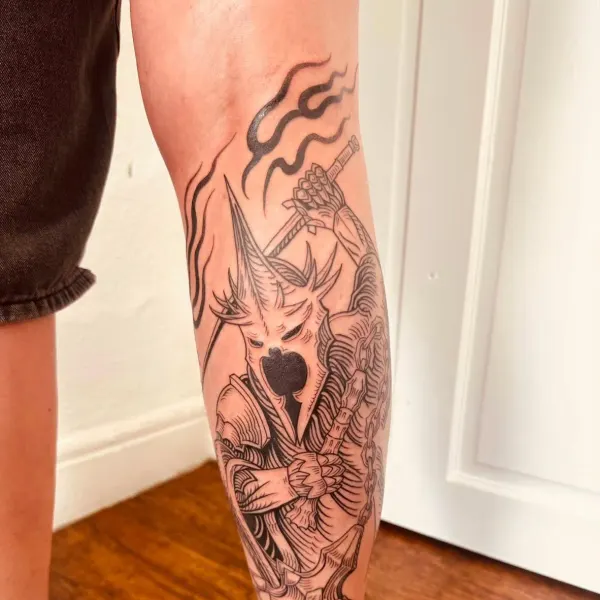 Medieval knight with sword and chains in engraving style linework, shin tattoo by Hannah at Shade Studio Peterborough